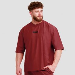 Koszulka męska fitness oversize Unstoppable Red. Czerwone koszulki sportowe męskie GYMBEAM, m, bez wzorów, z bawełny, bez kołnierzyka, bez ramiączek, na fitness i siłownię. Za 71.90 zł.