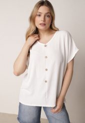 Biała Bluzka z Bawełną o Nietoperzowym Kroju z Guzikami Mistwin. Białe bluzki damskie Born2be, l, bez wzorów, z bawełny, klasyczne, bez kołnierzyka, bez ramiączek. Za 49.99 zł.