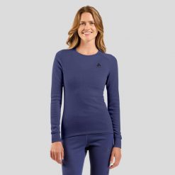 Bielizna termoaktywna z długim rękawem Odlo BL TOP crew neck l/s ACTIVE WARM. Niebieskia bielizna termoaktywna damska Odlo, l, bez wzorów, z materiału, bez ramiączek, długie. Za 259.99 zł.