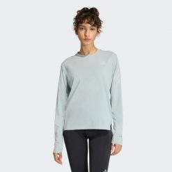 Koszulka z długim rękawem adi365 CLIMACOOL. Zielone obuwie sportowe damskie Adidas, bez wzorów, do biegania. Za 179.00 zł.