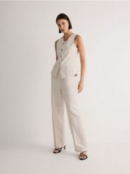 Spodnie w prążek z lnem - beżowy. Brązowe spodnie materiałowe damskie Reserved, l, bez wzorów, z bawełny. W wyprzedaży za 69.99 zł.