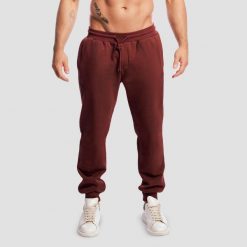 Spodnie męskie fitness oversize ze sznurkiem wiśniowe Base. Czerwone spodnie sportowe męskie GYMBEAM, m, bez wzorów, z bawełny, na fitness i siłownię. Za 140.90 zł.