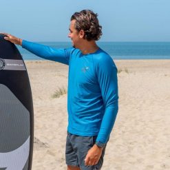 Męska koszulka surfing Watrflag Barcelona LS Bodyfit Niebieski. Niebieskie koszulki sportowe męskie WATRFLAG, l, bez wzorów, z elastanu, bez kołnierzyka, bez ramiączek, narciarskie. Za 139.00 zł.