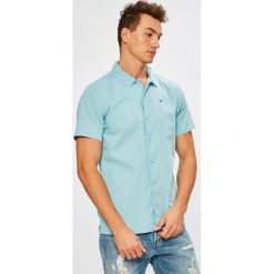 Tommy Jeans - Koszula. Szare koszule męskie Tommy Jeans, z bawełny, z klasycznym kołnierzykiem, z krótkim rękawem. W wyprzedaży za 219.90 zł.