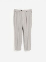 Spodnie garniturowe slim fit - brązowy. Brązowe eleganckie spodnie męskie Reserved, l, bez wzorów, z tkaniny. Za 169.99 zł.