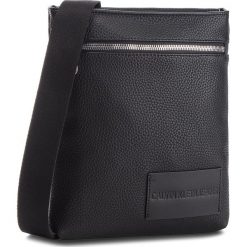Saszetka CALVIN KLEIN JEANS - Pebble Essential Fla K40K400658 001. Czarne saszetki męskie Calvin Klein Jeans, z jeansu, młodzieżowe. Za 349.00 zł.