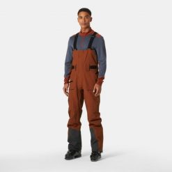 Spodnie narciarskie z szelkami Helly Hansen Sogn Shell. Brązowe spodnie snowboardowe męskie Helly Hansen, m, bez wzorów, narciarskie. Za 1,459.50 zł.