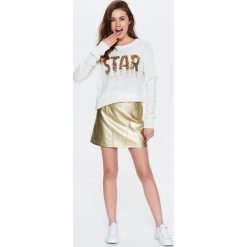 SWETER DAMSKI Z CEKINOWYM NAPISEM. Swetry damskie marki TROLL. W wyprzedaży za 24.99 zł.