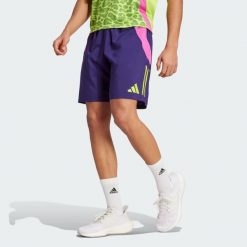 Szorty Generation Predator Downtime. Fioletowe krótkie spodenki sportowe męskie Adidas, s, bez wzorów, z materiału, do piłki nożnej. W wyprzedaży za 135.40 zł.
