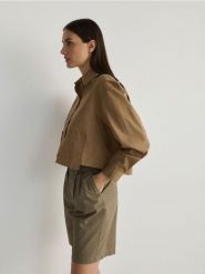 Szorty z kantem - zielony. Zielone szorty damskie Reserved, l, bez wzorów, z bawełny, klasyczne. W wyprzedaży za 59.99 zł.