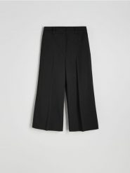 Spodnie culotte z kantem - czarny. Czarne spodnie materiałowe damskie Reserved, l, bez wzorów, z tkaniny. W wyprzedaży za 99.99 zł.