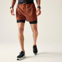 Shorty Męskie Movement II. Czerwone krótkie spodenki sportowe męskie Dare 2b, m, bez wzorów, trekkingowe. Za 211.99 zł.