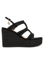 Guess Sandały FLJERS FAB04 Czarny. Czarne sandały damskie Guess, z aplikacjami, z materiału, bez obcasa, na koturnie, bez zapięcia. Za 679.99 zł.