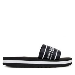 Klapki LOVE MOSCHINO. Czarne klapki damskie Love Moschino, bez wzorów, bez obcasa. Za 539.99 zł.