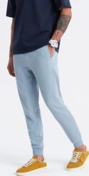 Ombre Męskie spodnie dresowe typu jogger - niebieskie V7 OM-PABS-0173 XL. Niebieskie spodnie sportowe męskie Ombre, m, bez wzorów, z dresówki. Za 89.99 zł.