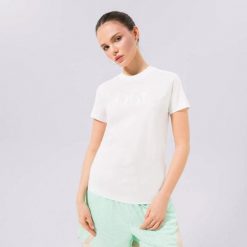 T-SHIRT DAMSKI KOSZULKA PUMA-T-SHIRT PUMA X VOGUE REGULAR TEE. Białe koszulki sportowe damskie Puma, uniwersalny, bez wzorów, z bawełny, bez kołnierzyka, bez ramiączek, na fitness i siłownię. Za 116.00 zł.
