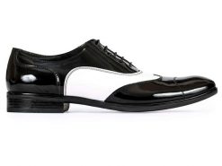 Czarno białe lakierki męskie - Spektatory Al Capone Caponki T25. Białe eleganckie półbuty Modini Moda Męska, ze skóry, klasyczne, bez zapięcia. W wyprzedaży za 333.00 zł.