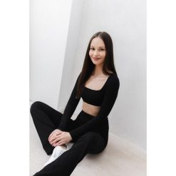 Top do jogi Moonholi Flash z długimi rękawami. Czarne koszulki sportowe damskie MOONHOLI, bez wzorów, sportowe, bez kołnierzyka. Za 259.00 zł.