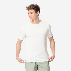 Koszulka UV surfingowa męska Olaian Water T-shirt krótki rękaw. Brązowe koszulki sportowe męskie OLAIAN, m, bez wzorów, z dzianiny, sportowe, bez kołnierzyka. Za 39.99 zł.