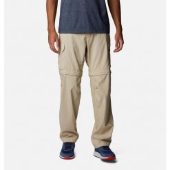 Spodnie Trekkingowe Męskie Columbia Silver Ridge Utility Convertible Pant. Brązowe spodnie sportowe męskie Columbia, m, bez wzorów, trekkingowe. Za 279.99 zł.