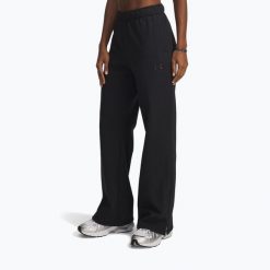 Spodnie treningowe damskie Under Armour Icon Vida Fleece. Czarne obuwie sportowe damskie Under Armour, bez wzorów, na fitness i siłownię. Za 279.99 zł.