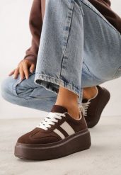 Brązowe Sneakersy Kultowe Tenisówki na Platformie z Koturnem Elisara. Brązowe trampki i tenisówki damskie Born2be, bez wzorów, z jeansu, bez zapięcia. Za 119.99 zł.