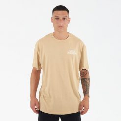 Koszulka męska z bawełny PEACEFUL beżowa. Brązowe buty sportowe męskie Legea, z bawełny, bez zapięcia, na fitness i siłownię. W wyprzedaży za 52.00 zł.