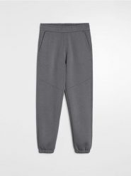 Spodnie dresowe regular fit - szary. Szare spodnie sportowe męskie Sinsay, l, bez wzorów, z dresówki. Za 49.99 zł.