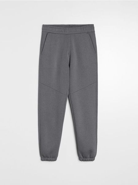 Spodnie dresowe regular fit - szary. Szare spodnie sportowe męskie Sinsay, l, bez wzorów, z dresówki. Za 49.99 zł.
