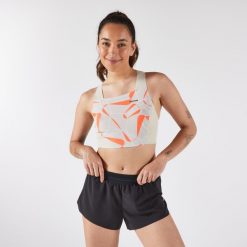 Koszulka do biegania bez rękawów damska Kiprun Race 900 Light crop top. Brązowe koszulki sportowe damskie KIPRUN, m, bez wzorów, z elastanu, bez kołnierzyka, bez ramiączek, do biegania. Za 129.99 zł.