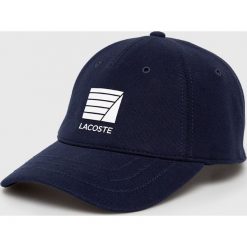 Lacoste - Czapka. Białe czapki i kapelusze męskie Lacoste, bez wzorów, z bawełny. W wyprzedaży za 129.90 zł.