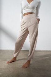 Spodnie do jogi Moonholi Moony Comfy Sweatpants z kieszeniami. Białe spodnie materiałowe damskie MOONHOLI, l, bez wzorów, z bawełny, na fitness i siłownię. Za 369.00 zł.
