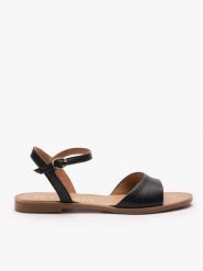 Czarne płaskie sandały. Czarne sandały damskie Ryłko, bez wzorów, z syntetyku, bez obcasa, na płaskiej podeszwie, bez zapięcia. Za 299.99 zł.