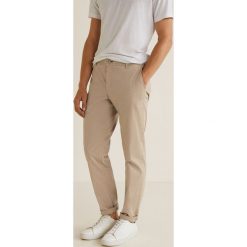 Mango Man - Spodnie Barna3. Eleganckie spodnie męskie marki Giacomo Conti. W wyprzedaży za 99.90 zł.