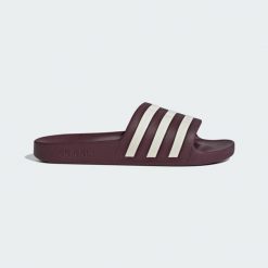 Klapki adilette Aqua. Białe klapki męskie Adidas, z materiału, klasyczne. Za 99.95 zł.