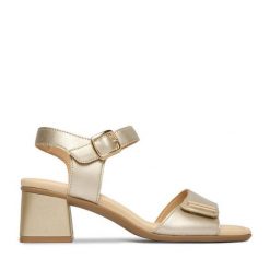 Sandały Remonte. Żółte sandały damskie Remonte, bez wzorów, bez obcasa, na słupku, bez zapięcia. Za 379.99 zł.