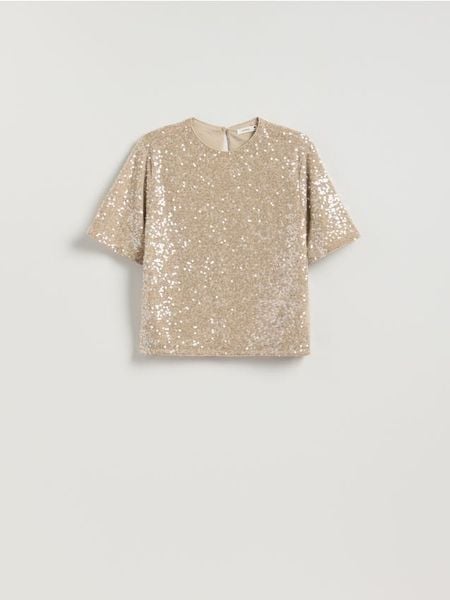Cekinowy t-shirt boxy - kremowy. Białe t-shirty damskie Reserved, l, bez wzorów, z dzianiny, bez kołnierzyka. Za 99.99 zł.