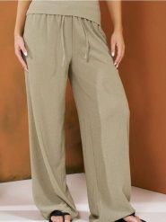 Luźne spodnie wide leg - wielobarwny. Spodnie materiałowe damskie Sinsay, l, bez wzorów. W wyprzedaży za 29.99 zł.