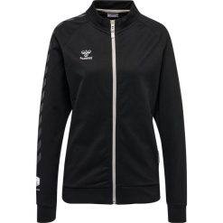 Damska bawełniana bluza dresowa zapinana na zamek Hummel Move Grid. Czarne bluzy sportowe damskie Hummel, bez wzorów, z bawełny, bez kaptura, do piłki nożnej. W wyprzedaży za 249.50 zł.
