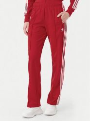 Adidas Spodnie dresowe adicolor Classics Firebird IR8081 Czerwony Regular Fit. Czerwone spodnie dresowe damskie Adidas, s, bez wzorów, z dresówki. Za 219.99 zł.