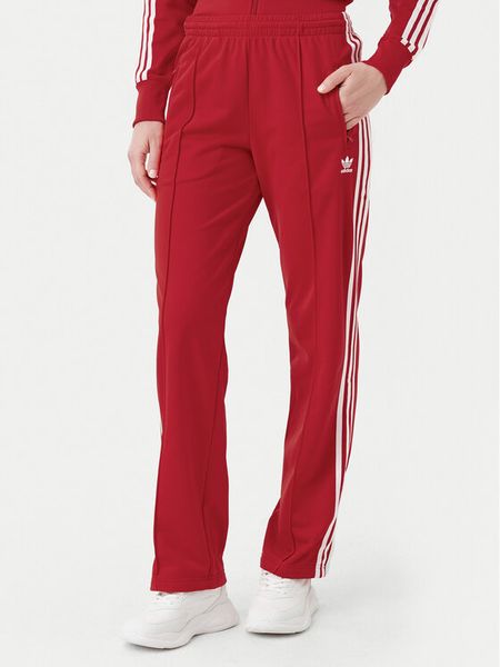 Adidas Spodnie dresowe adicolor Classics Firebird IR8081 Czerwony Regular Fit. Czerwone spodnie dresowe damskie Adidas, s, bez wzorów, z dresówki. Za 269.99 zł.