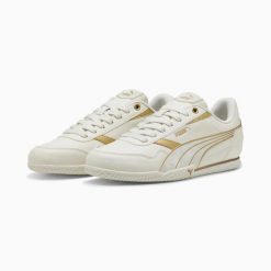 Buty sportowe damskie Puma BELLA DONNA DAYINIGHT 40267501. Brązowe obuwie sportowe damskie Puma, bez wzorów, z gumy. Za 184.26 zł.