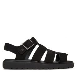 Sandały Calvin Klein Jeans. Czarne sandały damskie Calvin Klein Jeans, bez wzorów, z jeansu, bez obcasa, na płaskiej podeszwie, bez zapięcia. Za 259.99 zł.