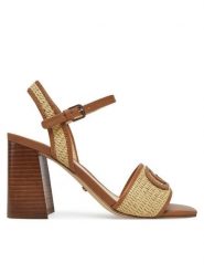 Guess Sandały FLJGNK FAB03 Beżowy. Brązowe sandały damskie Guess, z aplikacjami, ze skóry, bez obcasa, na słupku, bez zapięcia. Za 369.99 zł.