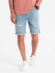 Męskie krótkie spodenki jeansowe z przetarciami i podwiniętą nogawką – jasnoniebieskie V1 OM-SRDS-0186 - XXL. Niebieskie szorty męskie Ombre Clothing, na lato, l, z aplikacjami, z bawełny. W wyprzedaży za 109.99 zł.