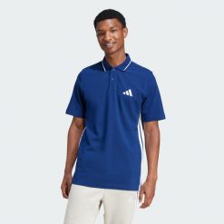 Koszulka Essentials 3-Stripes Piqué Polo. Białe koszulki polo męskie Adidas, xs, bez wzorów, z materiału, bez ramiączek. Za 179.00 zł.