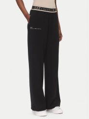 EA7 Emporio Armani Spodnie dresowe 7W000281 AF12501 UC001 Czarny Regular Fit. Czarne spodnie dresowe damskie EA7 Emporio Armani, xl, bez wzorów, z dresówki. Za 289.99 zł.