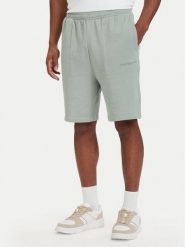 Tommy Hilfiger Szorty sportowe Essential UM0UM03914 Zielony jasny Regular Fit. Zielone krótkie spodenki sportowe męskie Tommy Hilfiger, m, bez wzorów, z bawełny. Za 209.99 zł.