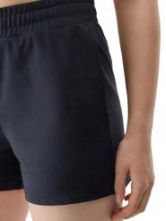SPODENKI DAMSKIE 4F TRENINGOWE SZYBKOSCHNĄCE KRÓTKIE KOLOR CZARNY. Czarne szorty sportowe damskie 4f, na lato, l, bez wzorów, z materiału, eleganckie, do biegania. Za 99.99 zł.