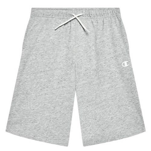 Spodnie sportowe chłopięce Champion 306027EM021. Szare spodnie sportowe dla chłopców Champion, bez wzorów, z bawełny, sportowe, krótkie, na jogę i pilates. Za 59.40 zł.